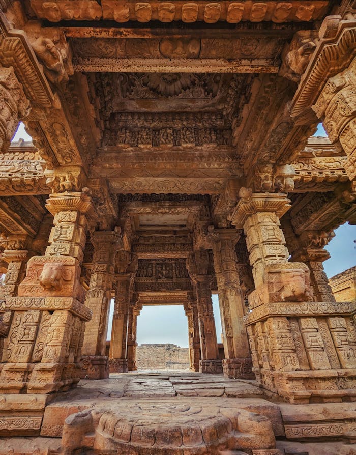 Ancient Indian temple showcasing intricate sandstone carvings and architectural beauty.